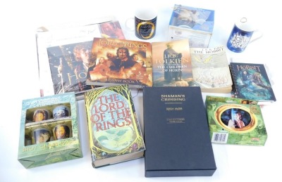 Lord of the Rings memorabilia, to include The Lord of the Rings hardback book, shot glass pack, mug, calendars, limited edition Shaman's Crossing book, etc. (1 box)