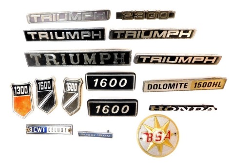 A group of motorcycle badges, to include BSA, Triumph Dolomite and others. (1 box)