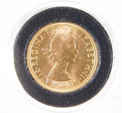 An Elizabeth II full gold sovereign, 1957, The First Gold Sovereign of Her Majesty's Reign, in plastic casing and outer Hatton's of London box, with paperwork. - 2