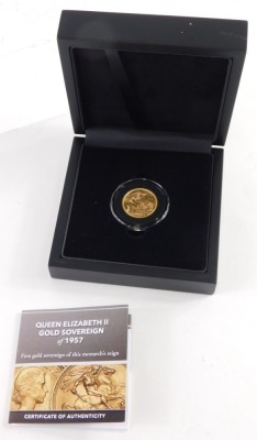 An Elizabeth II full gold sovereign, 1957, The First Gold Sovereign of Her Majesty's Reign, in plastic casing and outer Hatton's of London box, with paperwork. - 3