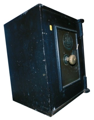 An early 20thC cast iron floor safe, of rectangular form, with hinged door, 51cm high, 42cm wide, 36cm deep. (with key)