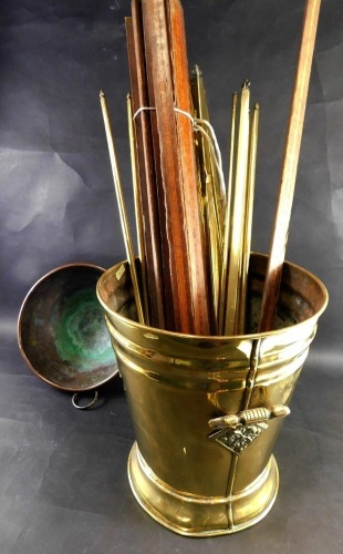 A brass two handled coal bucket, a Benham and Froud copper pan with ring handle, and various mahogany and satinwood cross banded stair rods.