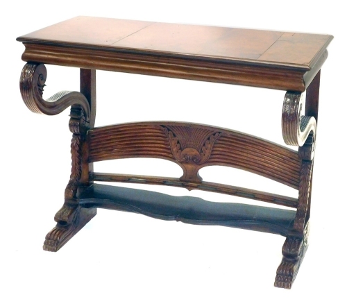 A 19thC style hardwood console table, 84cm high, 105cm wide.