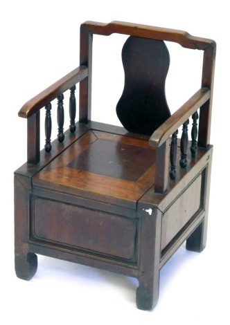 A Chinese hardwood child's commode chair.