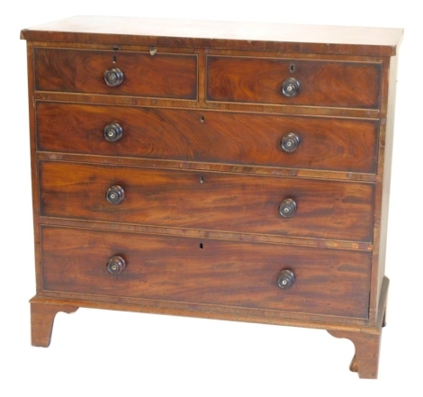 A Victorian flame mahogany chest of two short and three long graduated drawers, with knob handles and bracket feet, 120cm wide. (AF)