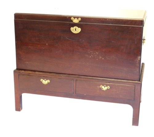 An early 19thC mahogany silver chest on stand, the base with two drawers, 102cm high, 125cm wide, 61cm deep.