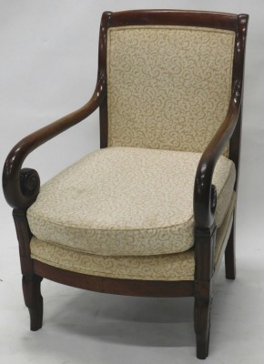 A 19thC mahogany show frame armchair, with scroll arms on inverted carved legs, with later floral upholstered back, seat, and cushion, 95cm high.