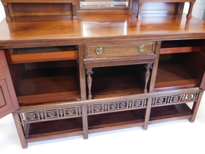 A 19thC aesthetic rosewood sideboard, in the manner of Lamb of Manchester, with central bevel glass surmounted by a raised metal work garland decoration, with carved floral patera above two shelves, single drawer and opening, flanked by further drawers an - 3