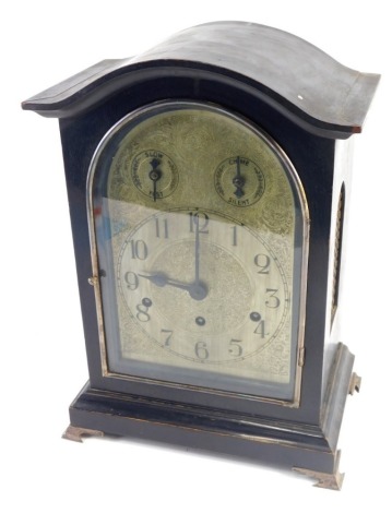 A 19thC ebonised bracket clock, the 17cm wide engraved domed back plate with Arabic dial fitted in an arched case on bracket feet, with chime, silent and slow/fast features, chiming movement striking on the hour and half hours, on four gongs, 42cm high. 