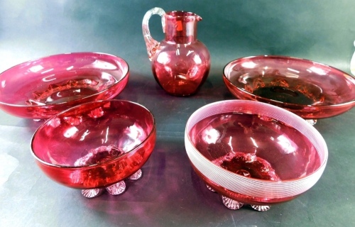 Various cranberry and ruby glassware, bowl, 14cm diameter, two various other bowls, a jug with plain glass strap work handle, etc. (a quantity)