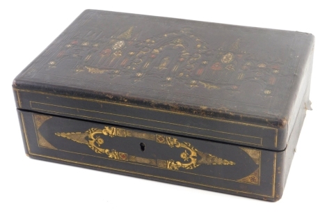 A 19thC part ebonised and leather writing slope, embossed to the outside with ecclesiastical motifs, Gothic arches, etc., the satinwood veneered interior with two inkwells, each with mother of pearl and ebony covers, incomplete, 35cm wide.