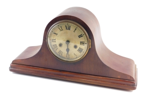 An Edwardian mahogany Napoleon hat mantel clock, with silvered dial.