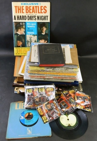 A quantity of ephemera, to include The Beatles A Hard Days Night film programme, Star Wars 2005 pin collection badges, Royal ephemera, etc.