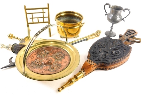 Miscellaneous metalware, to include a Continental brass copper and silver plated centrepiece, decorated with flowers, etc., a shovel, two fire pokers, carved oak bellows, etc.