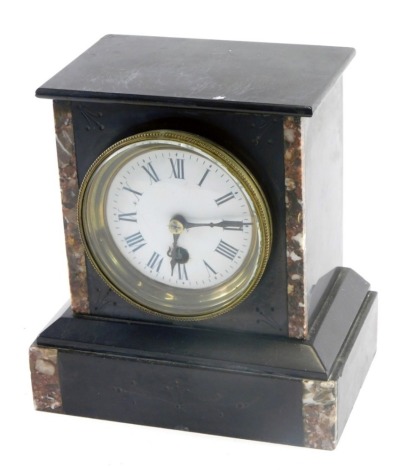 A late 19thC French black slate and marble mantel timepiece, with white enamel dial and Roman numerals, 21cm high.