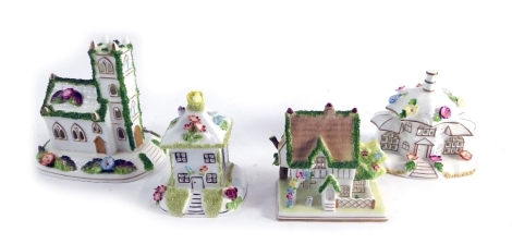 Four various Coalport cottages to include the parasol house 14cm high, etc, village church printed marks beneath etc, (4).