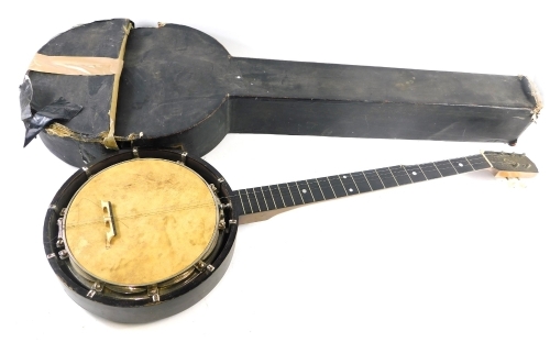 An early 20thC ebonised banjo, in canvas case. (AF)