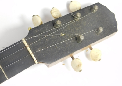 An early 20thC ebonised banjo, in canvas case. (AF) - 4