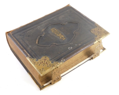 A Victorian National Comprehensive Family Bible, printed by Peter Black of Manchester, in leather and brass boards.