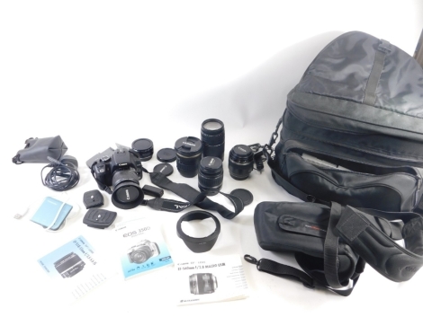 Various cameras and associated items, a Sairius F=70-210mm auto zoom lens, a Lower Pro canvas bag, 33cm wide, various other camera accessories, Canon lens, another 1.5M/4.9FT lens, Canon 350D digital EOS camera, various other accessories. (a quantity)