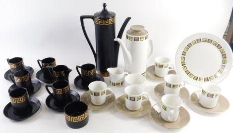 A Susan Williams-Ellis Portmeirion part coffee service, to include coffee pot, 35cm high, comprising milk jug, sugar bowl, cups and saucers, decorated with a gold Greek pattern on black ground, and a further G J Meakin Studio pottery coffee service, in sp