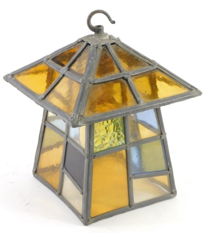 A lead glass panel shade, with amber glass sections, 26cm high.