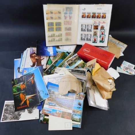 Various postcards, later cards, seaside and other resorts, a vacant stamp album, quantity of various used stamps etc. (a quantity)