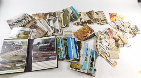 Various trade cards, postcards etc., loose tea cards, various black and white and other scenery postcards etc. (a quantity)