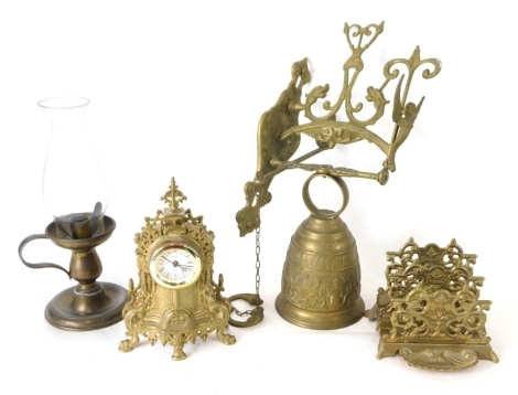 Various brassware, a French bell with hanging bracket, 27cm high, oil lamp, miniature clock, desk tidy with shell front, etc. (a quantity)