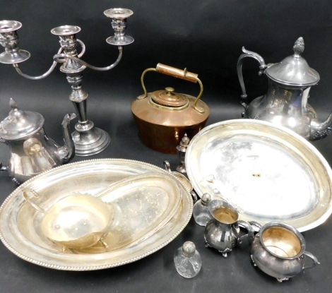 Various silver plated ware, metalware, etc., a brass and copper kettle, 23cm high, open entree dish, three branch candelabrum, other silver plated ware, and a small quantity of various glassware, pottery, shell shaped Belleek style kettle, etc. (a quantit