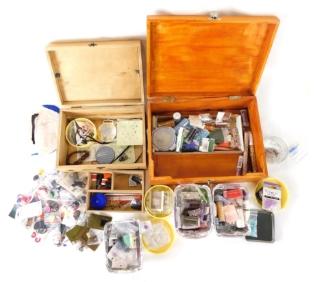 A pine sewing box, with glazed top and hinged lid, revealing a quantity of various sewing equipment, bird handled scissors, etc., 29cm wide, and a further transfer printed sewing box. (a quantity)