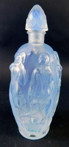 A Sabino glass perfume bottle, raised with figures of semi clad ladies, script mark and label beneath, 16cm high.