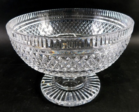 A Waterford crystal bowl, hobnail cut with a repeat geometric pattern on turned stem and circular foot, marked beneath, 14cm high.