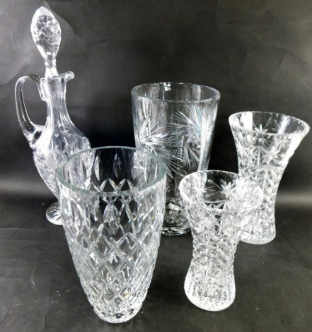 Various crystal glassware, vases etc, a ewer with shaped stopper, hobnail cut body and circular star cut base, 47cm high, and four various vases. (5)