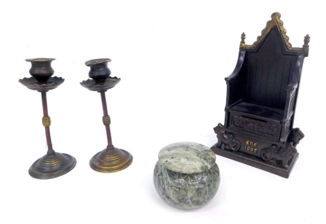 Various metalware and effects, a pair of early 20thC Benson style candlesticks with urn dish holder, on turned stems and stepped circular feet, 17cm high, and a Elizabeth II Coronation 1953 cast iron throne money box, marked Harper, and a serpentine lidde