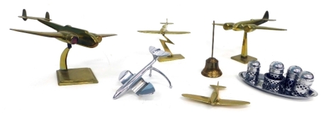 A brass model of a Spitfire, on lightening strike stand, 13cm high, another Spitfire model, lacking stand and two brass models of light WWII bombers, and another model plane, (5).