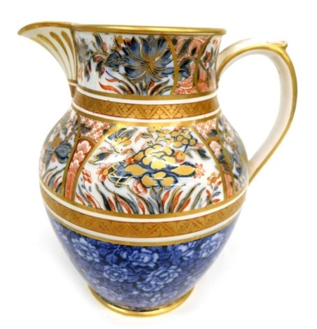 A 19thC pottery jug, vibrantly decorated with panels of flowers with a blue floral banding, unmarked, 22cm high.