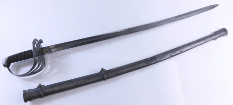 An officer's sword, with etched blade, turned grip, compressed pommel and pierced handle, 101cm long.