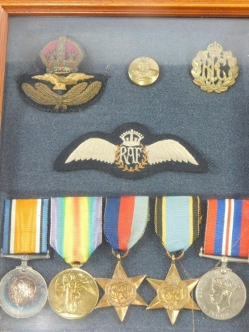 A WWI and WWII medal group, comprising Campaign and Victory medals for World War I, and 1939-45 and Air Crew Europe Stars, etc., with iron on and metal RAF medals, in case 31cm x 25cm.