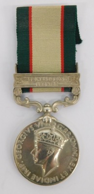 A George VI India medal, marked 14008 SEPOY MAKHMAD NUP 2-14 PUNJAB R, the ribbon with North West Frontiers 1936-37 clasp.