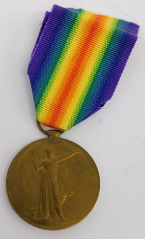 A World War I Victory medal, marked G-35002 PTE F FOCHTMAN MIDD.X R.