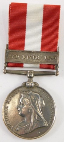 A Victorian Canada medal, unmarked, the ribbon with red river 1870 clasp.