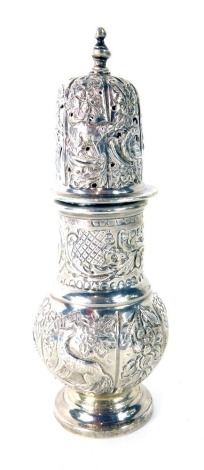 A small silver Victorian sugar sifter, by James Wakeley and Frank Charles Wheeler, cast and embossed with birds, scrolls etc, London 1899, 8oz.