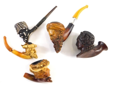 Various carved pipes, Meerschaum and others, to include a figure with beard wearing turban, 7cm high, various other carved figures tribal style and others, etc. (a quantity)