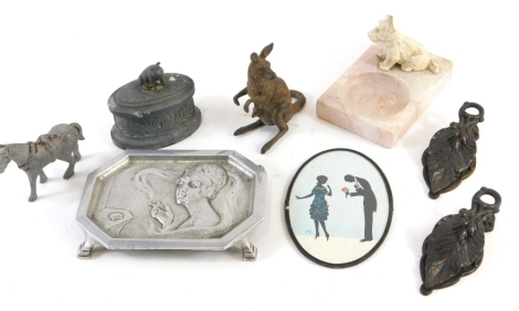 An Art Nouveau style aluminium tray, on mitre shaped feet, 5cm wide, a cold painted bronze figure of a female kangaroo with joey, lead casket, silhouette, dog ashtray on marbled ground, etc. (a quantity)