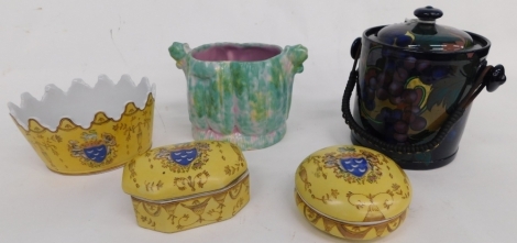 A Limoges Armorial porcelain lidded jar, with shield surmounted by lion, on yellow ground, 12cm wide, a similar circular jar and cover, Royal Stanley ware biscuit barrel decorated with fruit, etc. (a quantity)