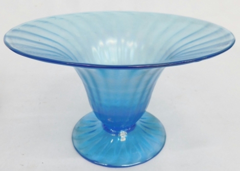 A 20thC Walsh opalescent blue glass vase, with compressed trumpet stem on circular foot with rough pontil, etched mark, 20cm diameter.