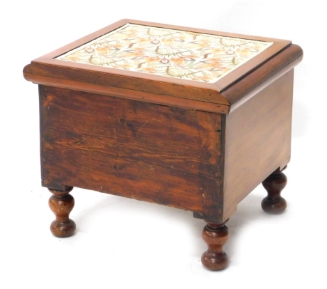 A Victorian flame mahogany commode, with embroidered top and fitted interior, on inverted double bun feet, 40cm high, 42cm wide, 39cm deep.