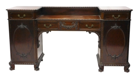 A 19thC Adam style mahogany pedestal sideboard, centred by a floral garland, flanked by two frieze drawers with two further upper drawers and panelled cupboards beneath, on scroll feet, 105cm high, 15cm wide, 61cm deep.