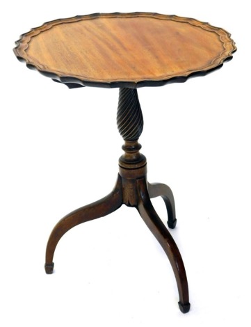 A Georgian style pie crust tilt top table, on turned stem and triple sabre legs, 60cm high, the top 52cm wide.